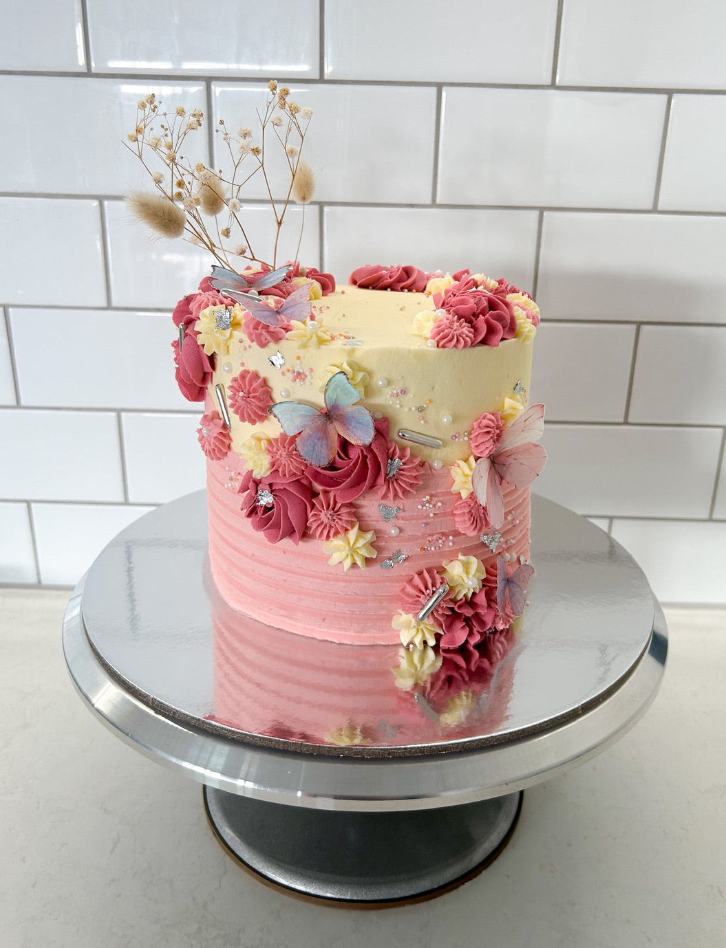 Pink two tone cake with butterfliesPink two tone cake with butterflies